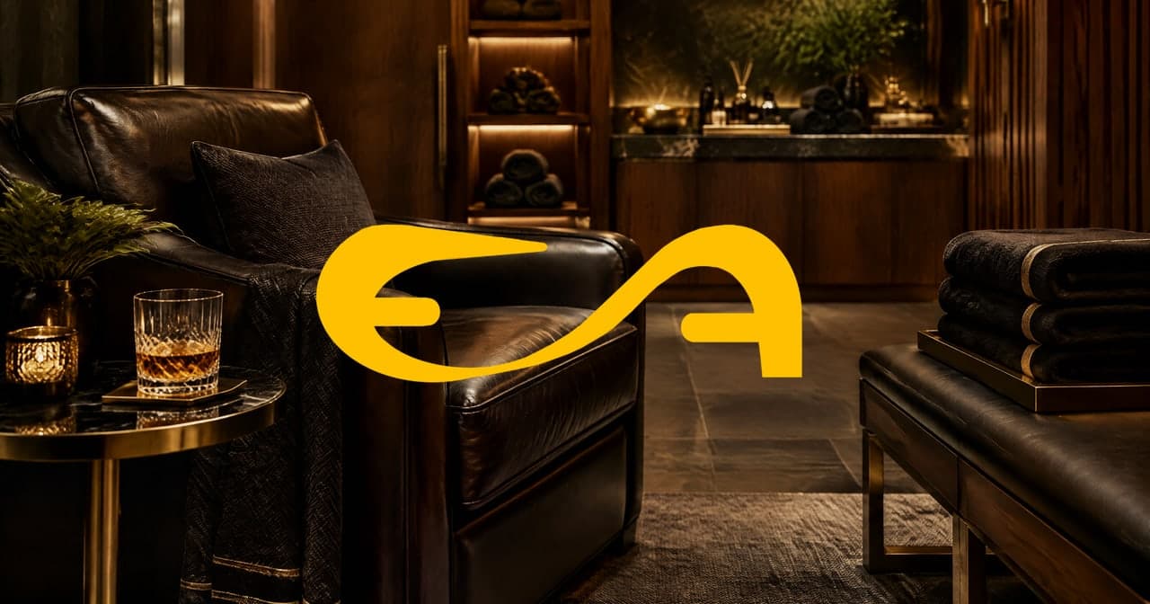 Lounge masculino de spa com poltrona de couro, copo de uísque e toalhas pretas
